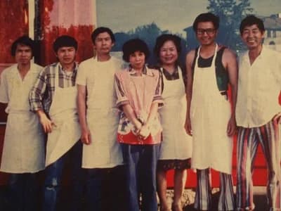 Family photo in the restaurant kitchen