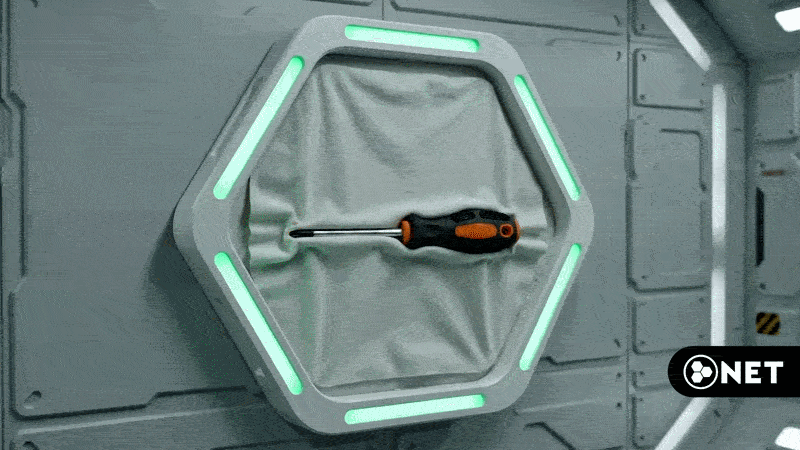 Screwdriver stretching the N.E.T. membrane from behind a glowing hexagonal frame